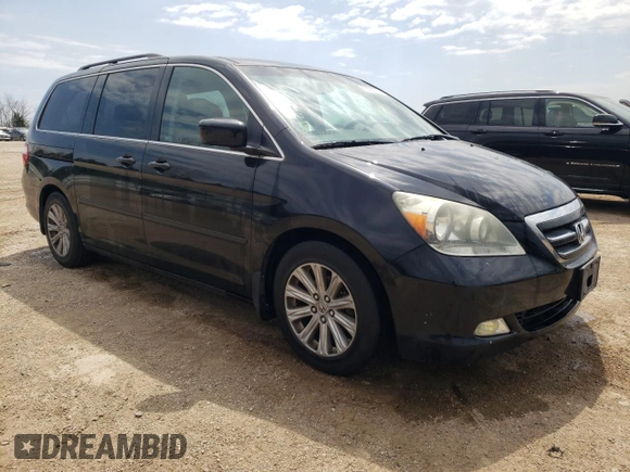 2007 Honda Odyssey Touring with VIN 5FNRL38847B022928, listed as a Copart auction lot 53869135 with 217,620 mi miles and Salvage Title. Bid and sale history available at DreamBid. Image 4.