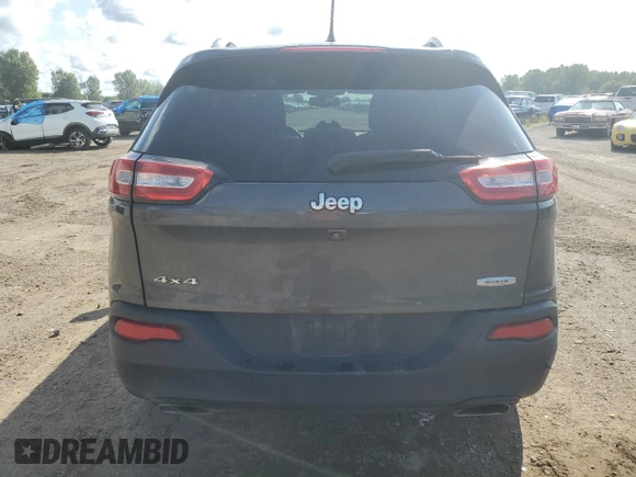 2015 Jeep Cherokee North with VIN 1C4PJMCSXFW582677, listed as a Copart auction lot 67999984 with 220,045 mi miles and Salvage Title. Bid and sale history available at carsss.com. Image 6.