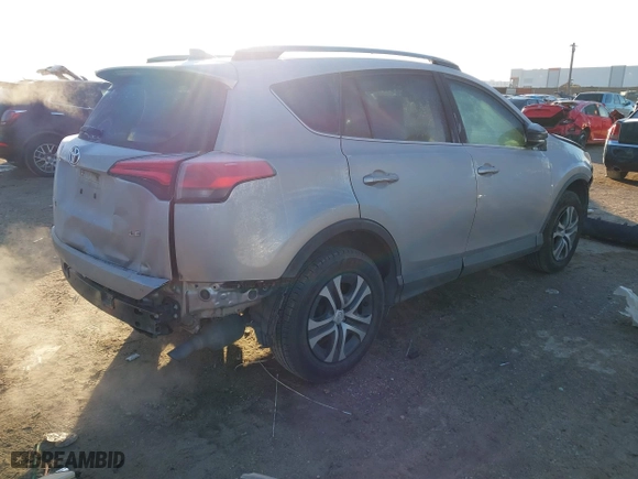 2017 Toyota RAV4 LE with VIN 2T3ZFREV3HW325229, listed as a IAAI auction lot 41290488 with 156,243 mi miles. Bid and sale history available at carsss.com. Image 4.