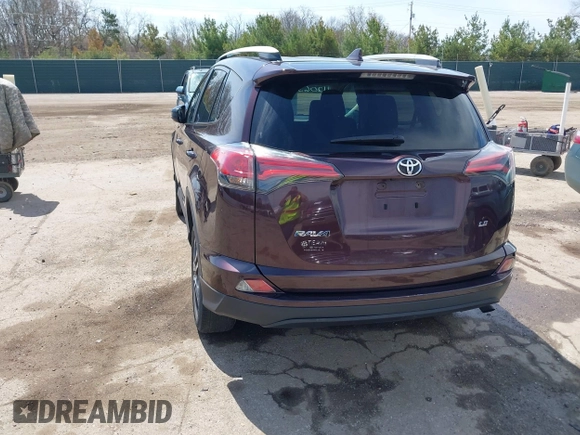 2016 Toyota RAV4 LE with VIN 2T3ZFREV8GW310580, listed as a IAAI auction lot 42063071 with 104,099 mi miles and . Bid and sale history available at DreamBid. Image 3.