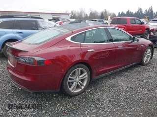 2012 Tesla Model S Performance with VIN 5YJSA1DP3CFS00394, listed as a IAAI auction lot 41309464 with 91,561 mi miles and . Bid and sale history available at DreamBid. Image 4.