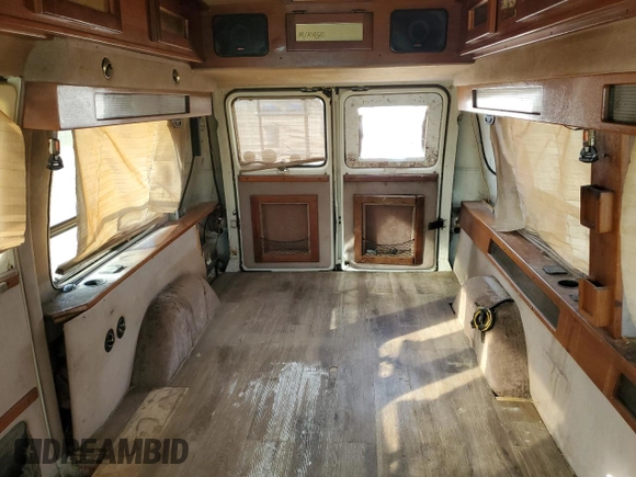 1995 Chevrolet Chevy Van с VIN 1GBEG25K1SF128372, выставлен на аукционе Copart как лот 78600654 с пробегом 183 522 миль миль и Списание • Salvage title. История ставок и продаж доступна на DreamBid. Изображение 10.