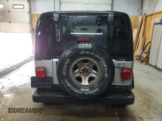 2000 Jeep Wrangler SE with VIN 1J4FA29PXYP714587, listed as a Copart auction lot 83755044 with 125,451 mi miles and Clean Title. Bid and sale history available at carsss.com. Image 6.