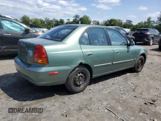 2005 Hyundai Accent GLS with VIN KMHCG45C35U622963, listed as a Copart auction lot 68292114 with 137,655 mi miles and Salvage Title. Bid and sale history available at carsss.com. Image 3.