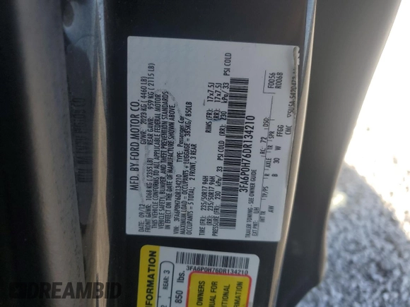 2013 Ford Fusion SE with VIN 3FA6P0H76DR134210, listed as a Copart auction lot 60654605 with 215,518 mi miles and Salvage title. Bid and sale history available at DreamBid. Image 12.