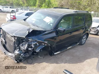 2011 Honda Pilot EX-L with VIN 5FNYF4H63BB004288, listed as a IAAI auction lot 42084984 with 215,019 mi miles and . Bid and sale history available at carsss.com. Image 2.