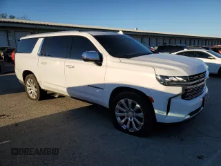 2022 Chevrolet Suburban Premier with VIN 1GNSKFKT7NR242288, listed as a Copart auction lot 79420734 with 77,006 mi miles and Salvage Title. Bid and sale history available at DreamBid. Image 4.