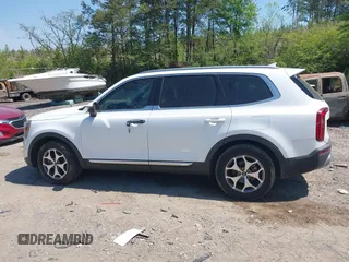 2020 Kia Telluride EX with VIN 5XYP34HC5LG008668, listed as a IAAI auction lot 42063077 with 59,480 mi miles and . Bid and sale history available at DreamBid. Image 13.