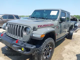 2021 Jeep Gladiator Rubicon with VIN 1C6JJTBG2ML515932, listed as a IAAI auction lot 42471704 with 57,775 mi miles and . Bid and sale history available at DreamBid. Image 18.