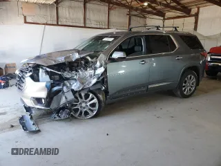 2018 Chevrolet Traverse Premier z VIN 1GNEVJKW9JJ261483, wystawiony jako Copart lot #50180235 z przebiegiem 97 537 mil mil oraz Szkoda całkowita • Salvage title. Historia ofert i sprzedaży dostępna na DreamBid. Obrazek 1.