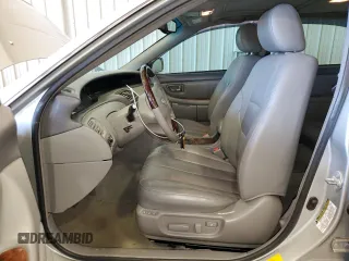 2004 Toyota Avalon XL with VIN 4T1BF28B34U383872, listed as a Copart auction lot 54830445 with 205,463 mi miles and Salvage Title. Bid and sale history available at carsss.com. Image 7.