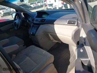 2012 Honda Odyssey LX with VIN 5FNRL5H29CB091860, listed as a IAAI auction lot 42000688 with 295,551 mi miles. Bid and sale history available at carsss.com. Image 5.