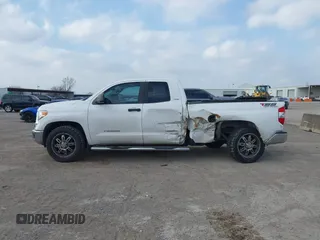 2016 Toyota Tundra SR z VIN 5TFRM5F10GX097792, wystawiony jako IAAI lot #41516069 z przebiegiem 199 598 mil mil oraz . Historia ofert i sprzedaży dostępna na DreamBid. Obrazek 6.