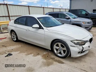 2014 BMW 3 Series 320i z VIN WBA3B1C57EP679989, wystawiony jako Copart lot #56383665 z przebiegiem 125 617 mil mil oraz Szkoda całkowita • Salvage title. Historia ofert i sprzedaży dostępna na DreamBid. Obrazek 4.
