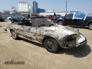 1978 Alfa Romeo Spider z VIN 115410002428, wystawiony jako Copart lot #56698104 z przebiegiem Nie podano mil oraz Szkody całkowita. Historia ofert i sprzedaży dostępna na DreamBid. Obrazek 4.