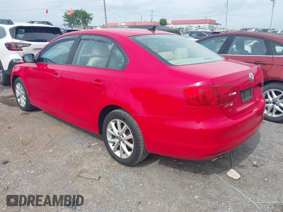 2012 Volkswagen Jetta SE with VIN 3VWDX7AJ0CM322455, listed as a IAAI auction lot 42279027 with 121,214 mi miles and . Bid and sale history available at DreamBid. Image 3.