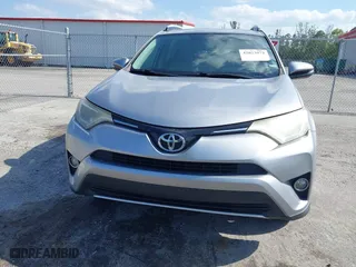 2016 Toyota RAV4 XLE with VIN 2T3WFREV7GW280362, listed as a IAAI auction lot 42023972 with 160,651 mi miles. Bid and sale history available at carsss.com. Image 13.