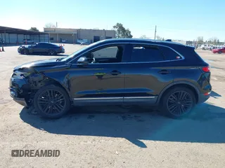 2015 Lincoln MKC with VIN 5LMTJ2AH6FUJ13505, listed as a IAAI auction lot 41871254 with 107,924 mi miles. Bid and sale history available at carsss.com. Image 14.