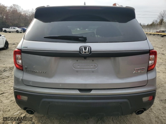 2020 Honda Passport Touring with VIN 5FNYF8H96LB004076, listed as a Copart auction lot 81239214 with 55,787 mi miles and Salvage Title. Bid and sale history available at carsss.com. Image 6.