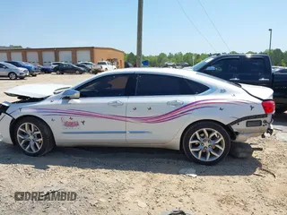 2017 Chevrolet Impala Premier with VIN 1G1145S38HU150772, listed as a IAAI auction lot 41987412 with 163,587 mi miles and . Bid and sale history available at DreamBid. Image 15.