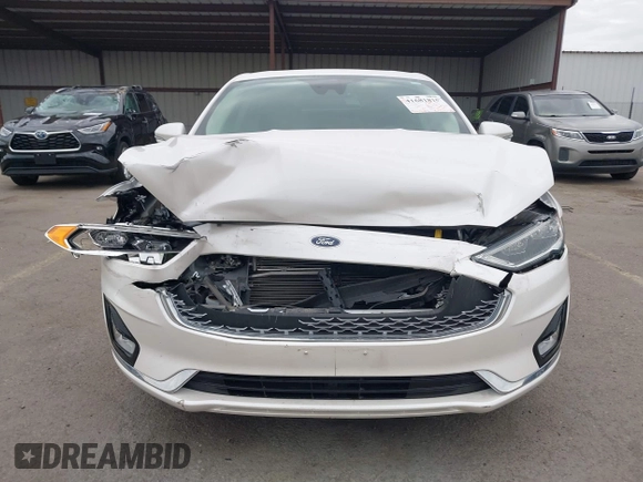 2020 Ford Fusion Titanium with VIN 3FA6P0K92LR103416, listed as a IAAI auction lot 41681810 with 54,902 mi miles and . Bid and sale history available at DreamBid. Image 12.