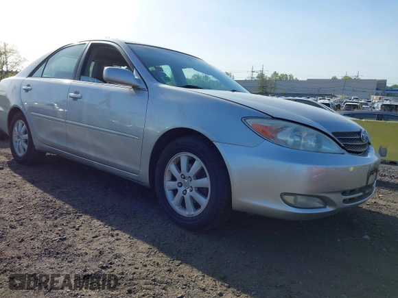 2003 Toyota Camry LE with VIN 4T1BE30K43U227357, listed as a IAAI auction lot 42144237 with 101,135 mi miles and . Bid and sale history available at DreamBid. Image 1.