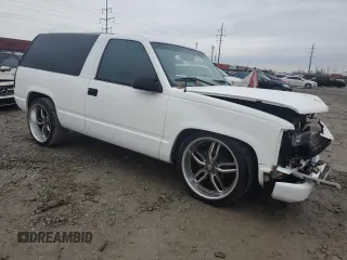 1997 GMC Yukon with VIN 3GKEC18R0VG523581, listed as a Copart auction lot 79601454 with 184,548 mi miles and Salvage Title. Bid and sale history available at carsss.com. Image 4.