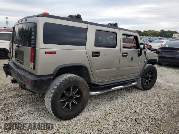 2006 Hummer H2 z VIN 5GRGN23U26H101561, wystawiony jako Copart lot #89308685 z przebiegiem 327 103 mil mil oraz Tytuł czysty. Historia ofert i sprzedaży dostępna na DreamBid. Obrazek 3.