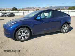 2024 Tesla Model Y Long Range with VIN 7SAYGDEEXRF983989, listed as a Copart auction lot 64035155 with 12,137 mi miles and Salvage title. Bid and sale history available at DreamBid. Image 1.