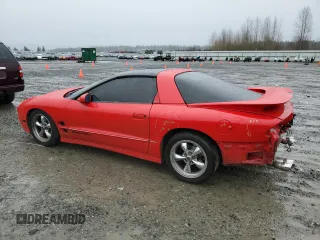 1998 Pontiac Firebird Formula z VIN 2G2FV22G4W2200991, wystawiony jako Copart lot #84553624 z przebiegiem 129 605 mil mil oraz Szkoda całkowita • Salvage title. Historia ofert i sprzedaży dostępna na DreamBid. Obrazek 2.