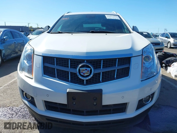 2012 Cadillac SRX Performance Collection с VIN 3GYFNEE33CS585109, выставлен на аукционе IAAI как лот 41657155 с пробегом 155 013 миль миль и . История ставок и продаж доступна на DreamBid. Изображение 6.