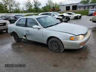 1995 Toyota Camry LE z VIN 4T1SK12E2SU617134, wystawiony jako Copart lot #54775365 z przebiegiem 305 046 mil mil oraz Szkoda całkowita • Salvage title. Historia ofert i sprzedaży dostępna na DreamBid. Obrazek 4.