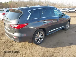 2014 Infiniti QX60 with VIN 5N1AL0MM9EC543096, listed as a IAAI auction lot 41909546 with 128,479 mi miles. Bid and sale history available at carsss.com. Image 4.