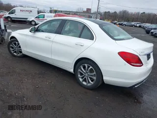 2015 Mercedes-Benz C-Class C 300 Luxury with VIN 55SWF4KBXFU052095, listed as a IAAI auction lot 41792142 with 104,177 mi miles. Bid and sale history available at carsss.com. Image 3.