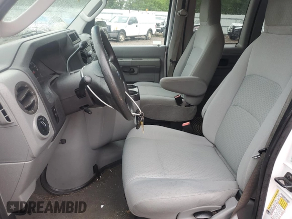 2009 Ford Econoline Passenger XL with VIN 1FBNE31L49DA74498, listed as a Copart auction lot 56381945 with 95,695 mi miles and Salvage title. Bid and sale history available at DreamBid. Image 7.