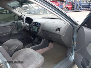 2000 Honda Civic VP with VIN 2HGEJ6614YH547366, listed as a IAAI auction lot 42059413 with 139,669 mi miles. Bid and sale history available at carsss.com. Image 5.