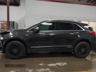 2018 Cadillac XT5 Luxury FWD with VIN 1GYKNCRS8JZ184322, listed as a IAAI auction lot 41225319 with 97,729 mi miles and . Bid and sale history available at carsss.com. Image 14.