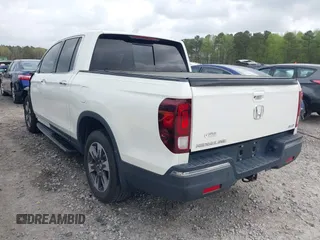2019 Honda Ridgeline RTL-E with VIN 5FPYK3F78KB018356, listed as a IAAI auction lot 41946363 with 61,472 mi miles and . Bid and sale history available at DreamBid. Image 3.