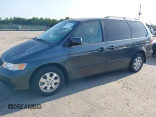 2003 Honda Odyssey EX with VIN 5FNRL18673B112958, listed as a IAAI auction lot 42172282 with 189,521 mi miles and . Bid and sale history available at DreamBid. Image 14.