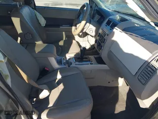 2011 Mercury Mariner Premier with VIN 4M2CN9HG4BKJ05985, listed as a IAAI auction lot 41132168 with 84,031 mi miles. Bid and sale history available at carsss.com. Image 5.