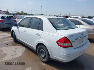 2008 Nissan Versa 1.8 S with VIN 3N1BC11E38L392277, listed as a IAAI auction lot 41927976 with 135,795 mi miles. Bid and sale history available at carsss.com. Image 3.