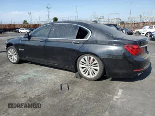 2015 BMW 7 Series 740Li with VIN WBAYE4C52FD946831, listed as a Copart auction lot 49014195 with 137,447 mi miles and Salvage Title. Bid and sale history available at DreamBid. Image 2.