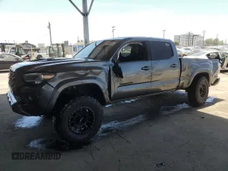 2020 Toyota Tacoma SR5 with VIN 3TMBZ5DN4LM024014, listed as a Copart auction lot 58260065 with 145,836 mi miles and Salvage title. Bid and sale history available at DreamBid. Image 1.
