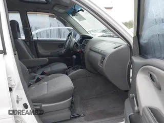 2004 Chevrolet Tracker z VIN 2CNBE134946916733, wystawiony jako IAAI lot #42436659 z przebiegiem 252 417 mil mil oraz . Historia ofert i sprzedaży dostępna na DreamBid. Obrazek 5.