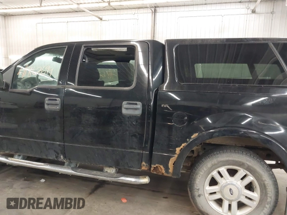 2004 Ford F-150 XLT with VIN 1FTPW14554KC20463, listed as a IAAI auction lot 41862699 with 204,126 mi miles. Bid and sale history available at carsss.com. Image 6.