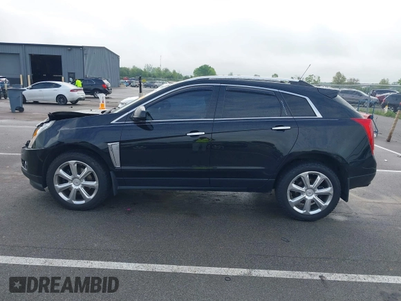 2015 Cadillac SRX Performance Collection with VIN 3GYFNCE3XFS638994, listed as a IAAI auction lot 42243558 with 141,704 mi miles and . Bid and sale history available at DreamBid. Image 14.