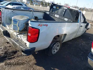 2015 Chevrolet Silverado 1500 Work Truck with VIN 1GCNKPEC6FZ355609, listed as a IAAI auction lot 41819740 with 125,703 mi miles. Bid and sale history available at carsss.com. Image 4.