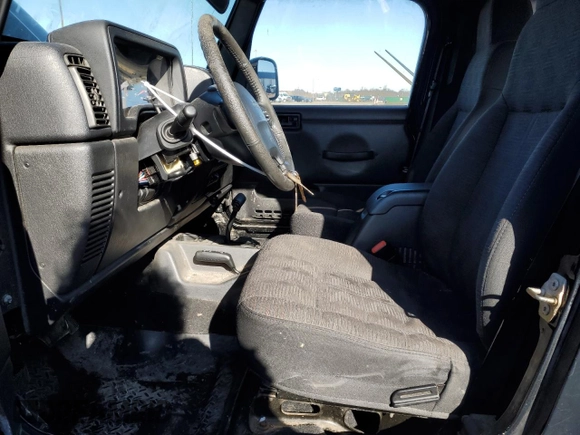 2003 Jeep Wrangler X with VIN 1J4FA39S33P357059, listed as a Copart auction lot 48983315 with 166,532 mi miles and Salvage title. Bid and sale history available at DreamBid. Image 7.