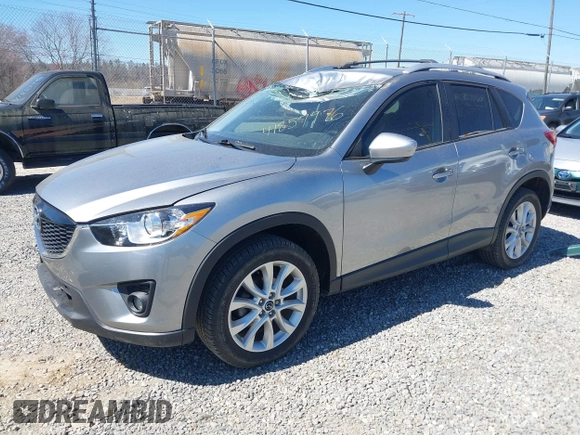 2014 Mazda CX-5 Grand Touring with VIN JM3KE4DY3E0368169, listed as a IAAI auction lot 41857976 with 127,853 mi miles. Bid and sale history available at carsss.com. Image 18.