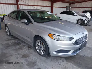 2017 Ford Fusion Hybrid SE with VIN 3FA6P0LU4HR287932, listed as a IAAI auction lot 42765442 with 320,374 mi miles and . Bid and sale history available at DreamBid. Image 1.